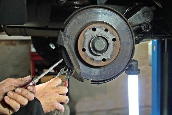 mechanic performing a brake repair